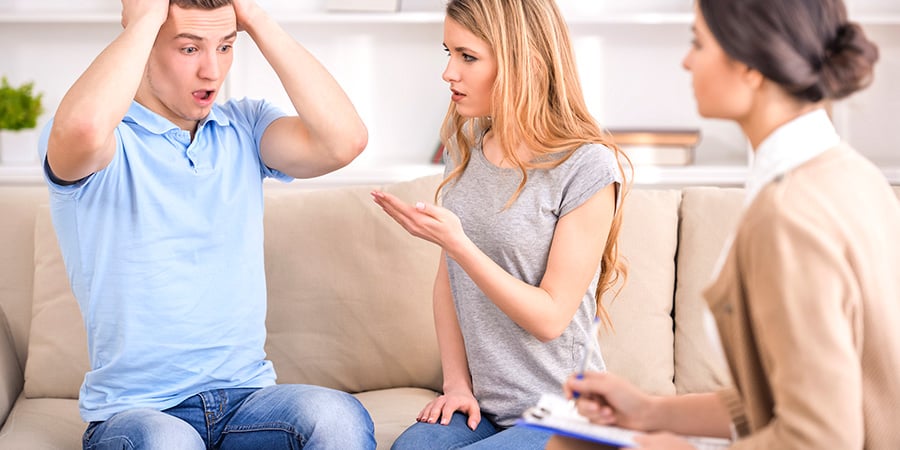 couple sitting in therapy session